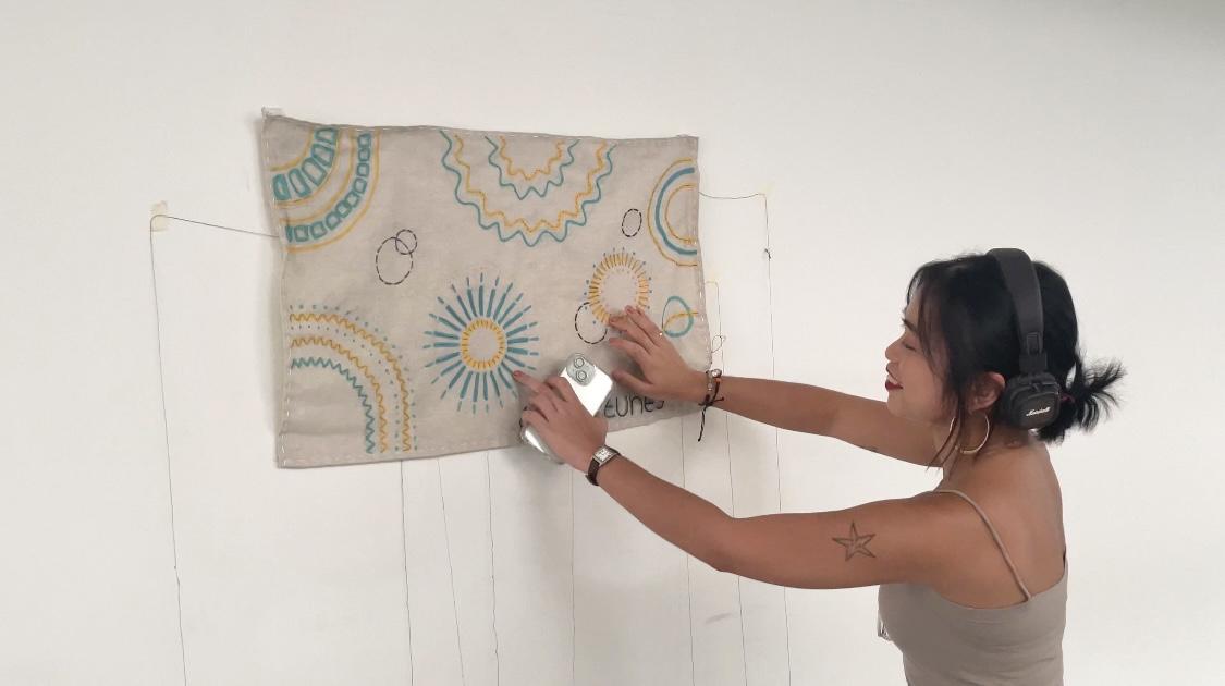 Close-up of conductive threads on the playmat